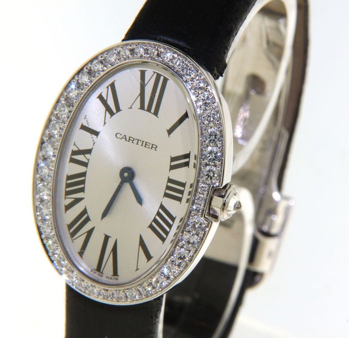 The 18k white gold fake watch is decorated with diamonds.